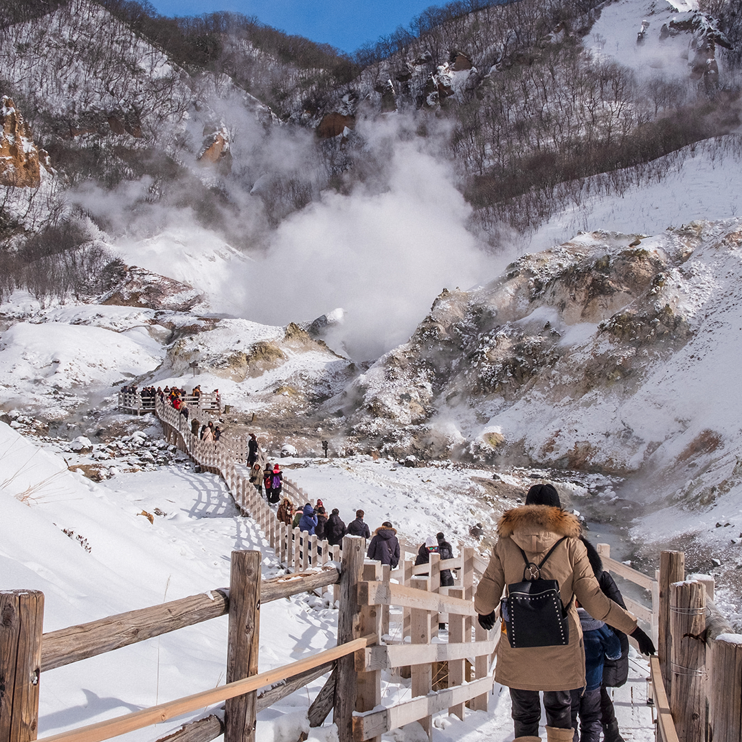 People visit Noboribetsu Onsen’s main hot spring source Jigokudani, also known as Hell Valley, to see the billowing steam from the geothermal vents.